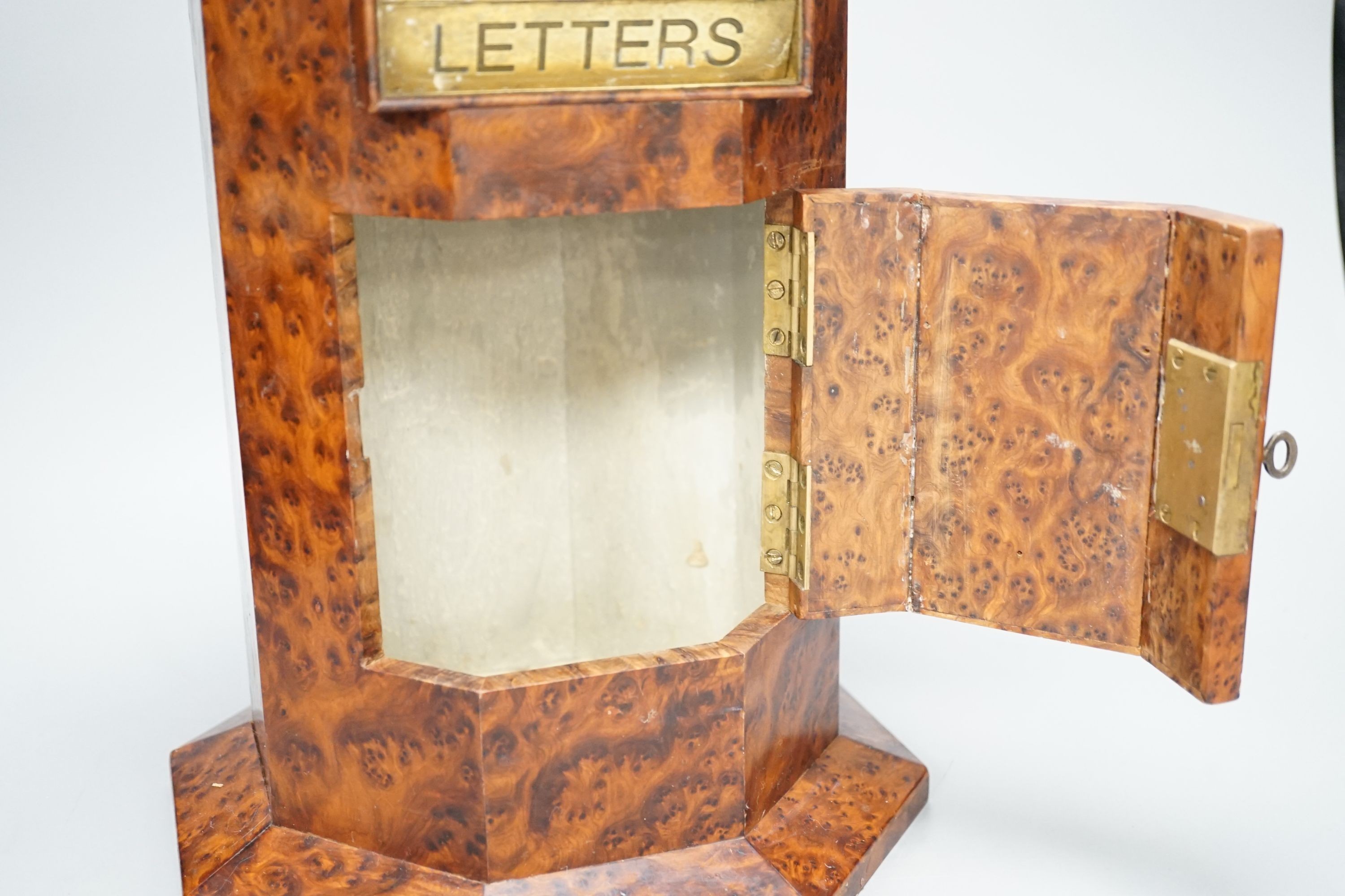 A Victorian-style amboyna octagonal country house post box, 34 cms high.